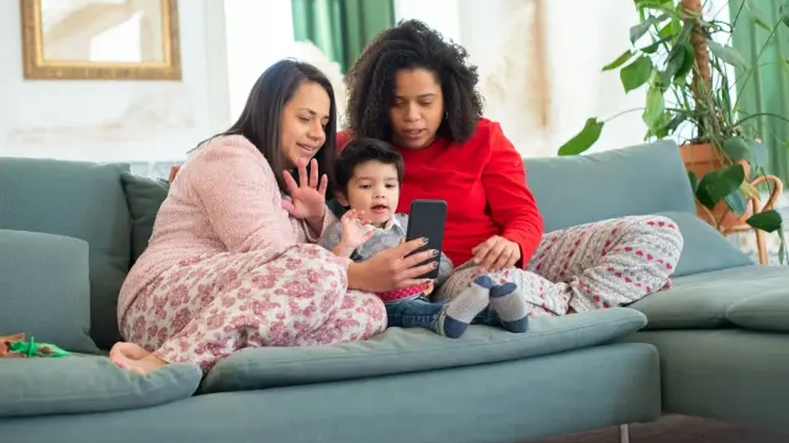 Family checking mobile service on a phone